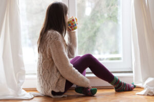 Enjoying tea by the window