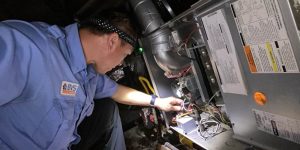 why does my furnace whistle when it turns on